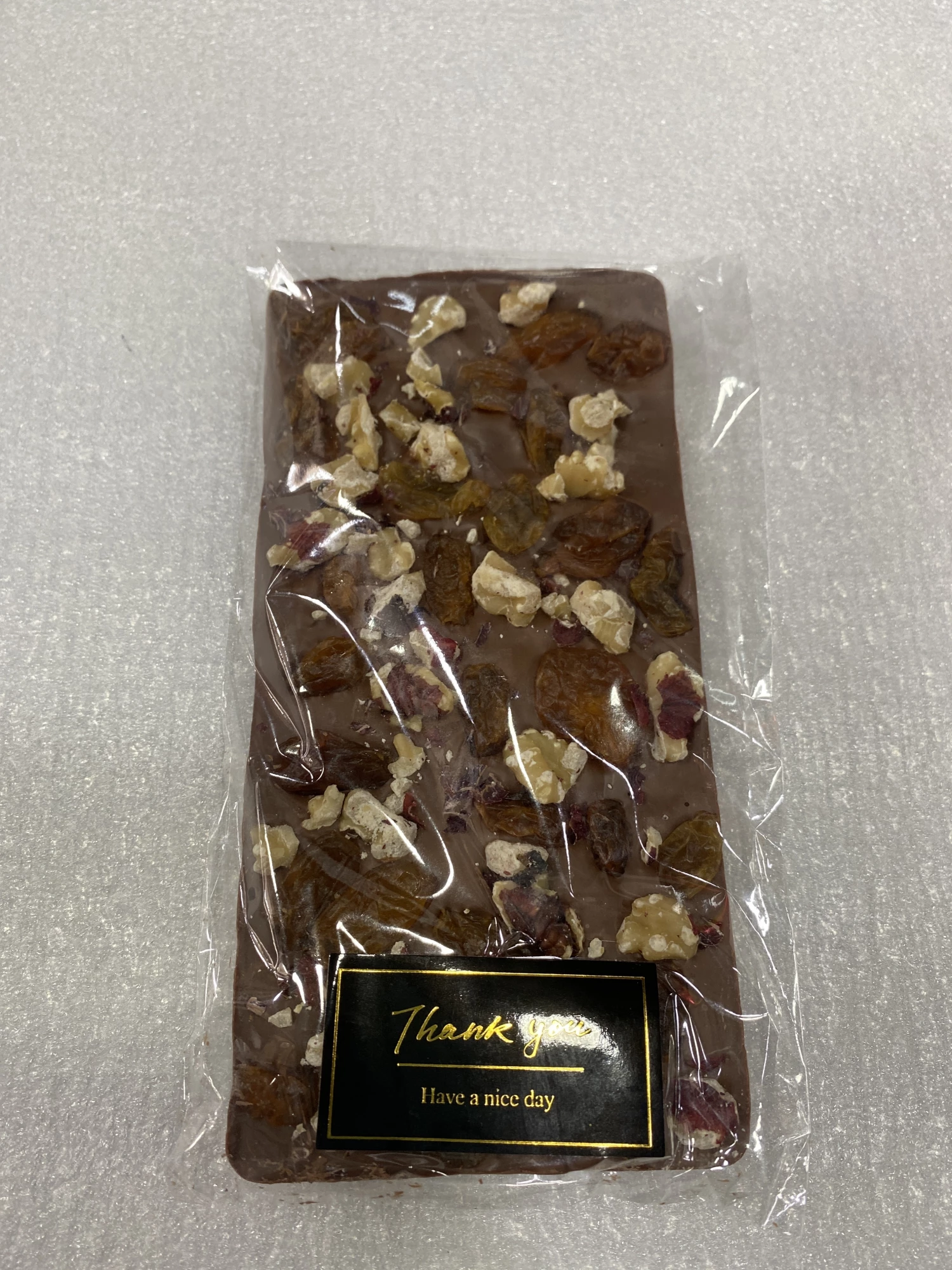 MILK CHOCOLATE RAISIN WITH WALNUT